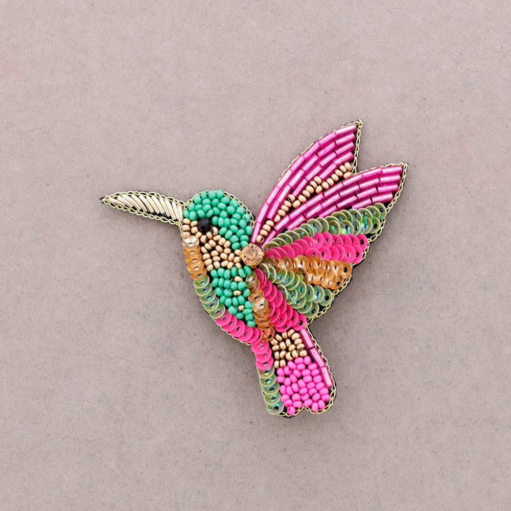 Broche oiseau en perles