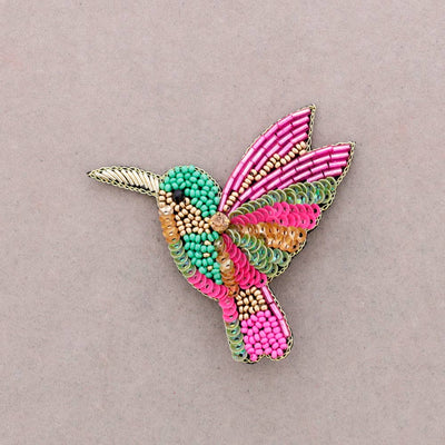 Broche oiseau en perles