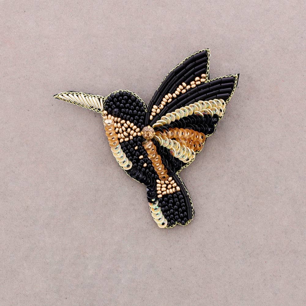 Broche oiseau en perles