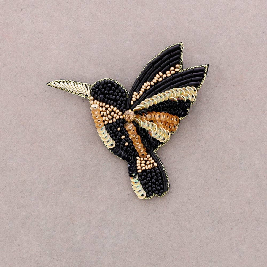 Broche oiseau en perles