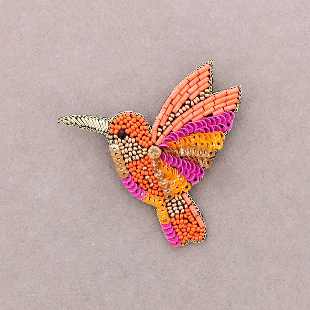 Broche oiseau en perles