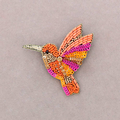 Broche oiseau en perles