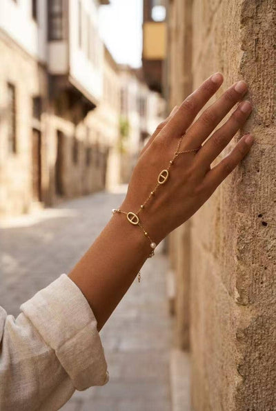 Bracelet de main doré acier inoxydable perles ovale délicat