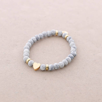 Bracelet élastique perles avec cœur