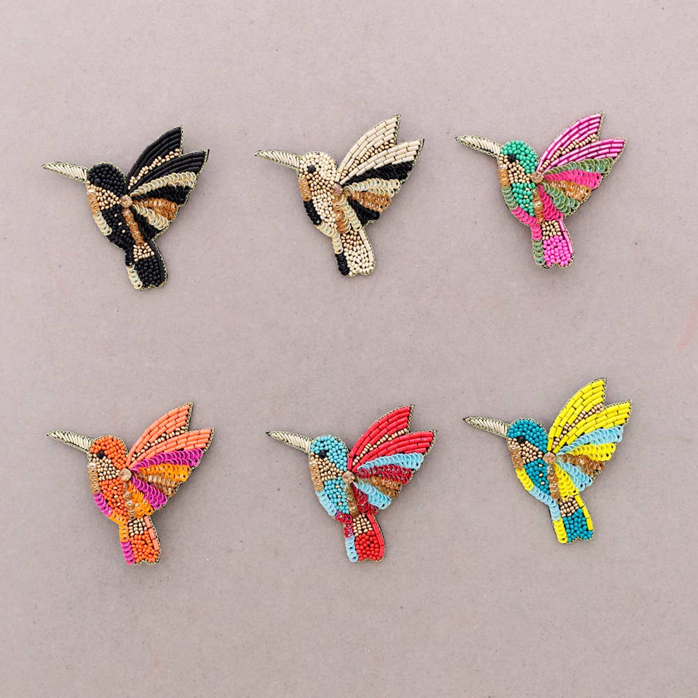 Broche oiseau en perles