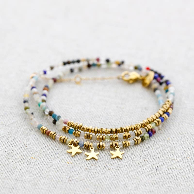 Bracelet en acier triple tour avec pierres étoile pendantes