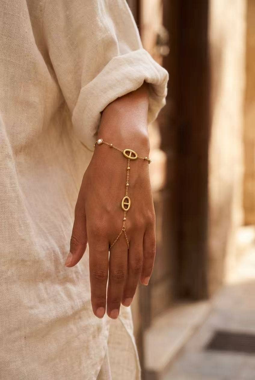 Bracelet de main doré acier inoxydable perles ovale délicat