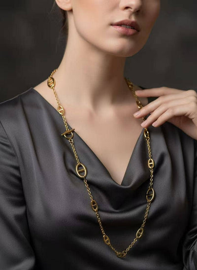 Collier sautoir doré maillons ovales irréguliers acier