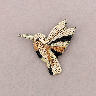 Broche oiseau en perles