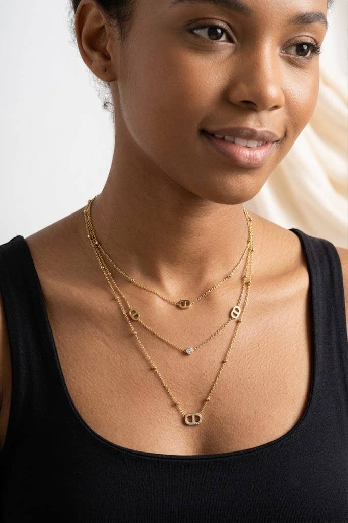 Collier triple tour ovale acier inoxydable doré moderne chic