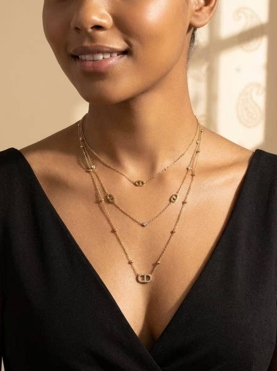 Collier triple tour ovale acier inoxydable doré moderne chic