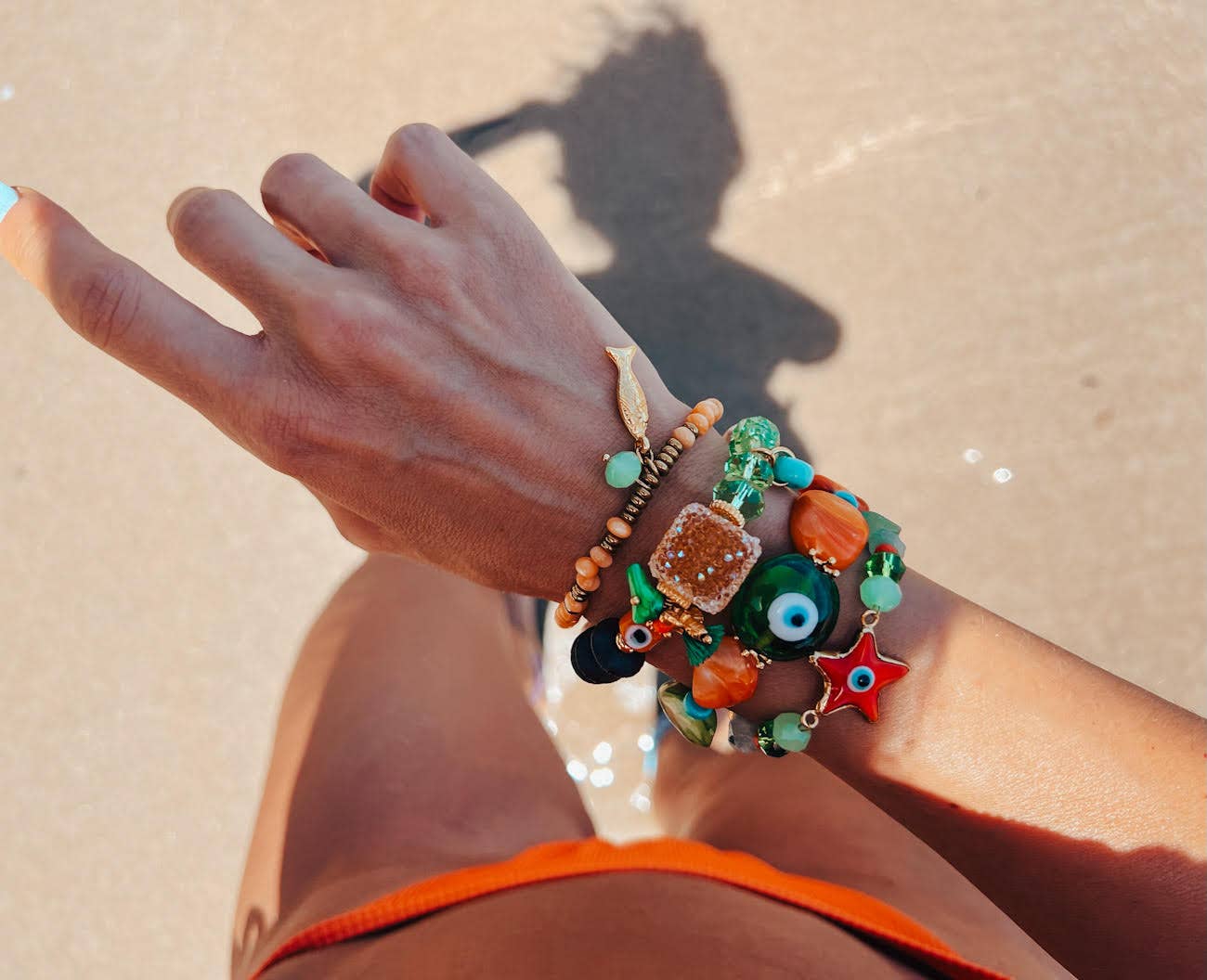 Bracelets d'été orange et vert avec œil protecteur en coquillage