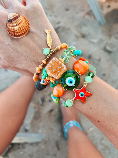Bracelets d'été orange et vert avec œil protecteur en coquillage
