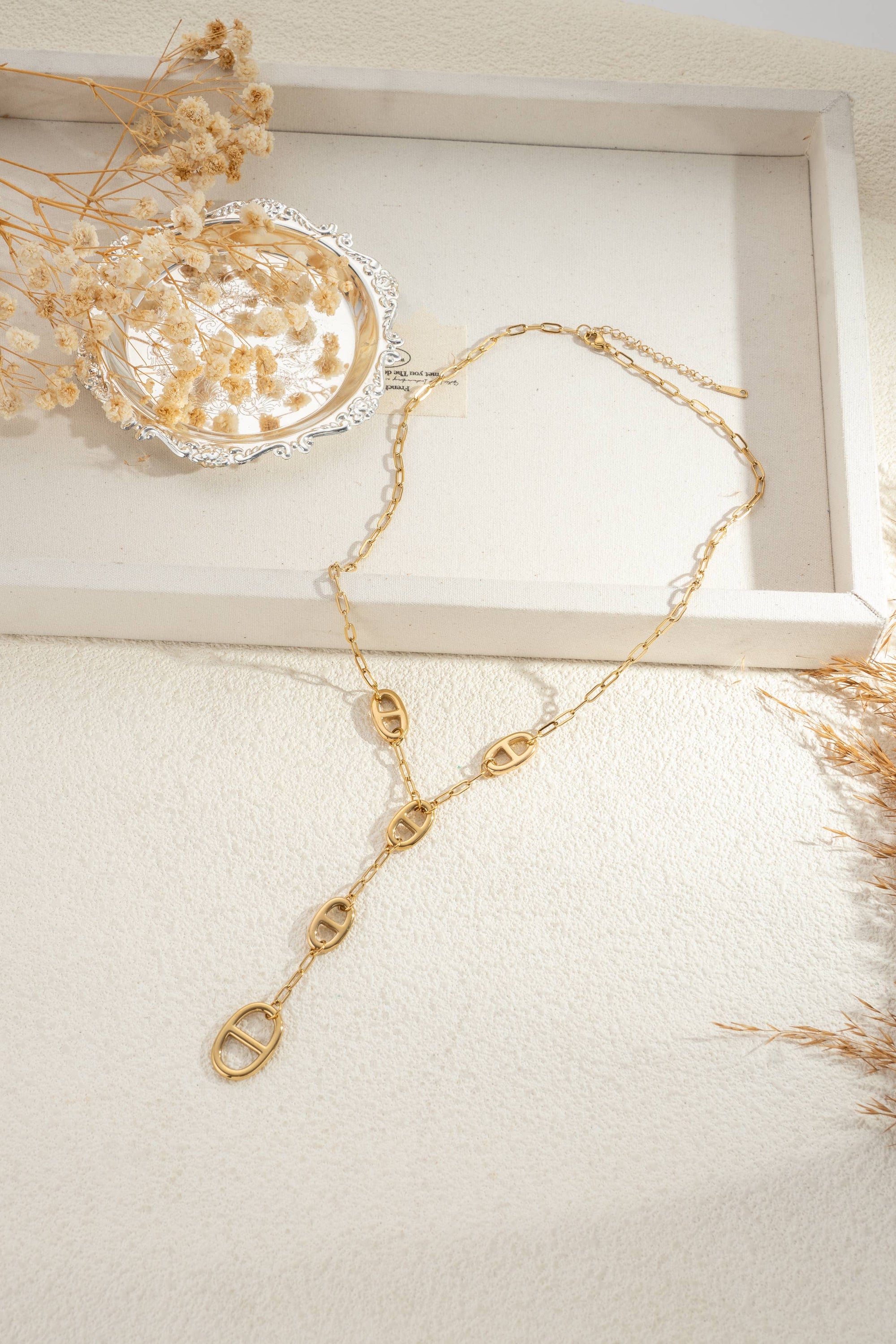 Collier maillons ovales doré moderne graphique élégant