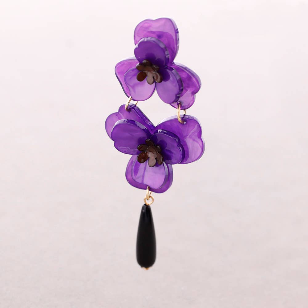 Boucles d'oreilles pendantes double fleur en résine