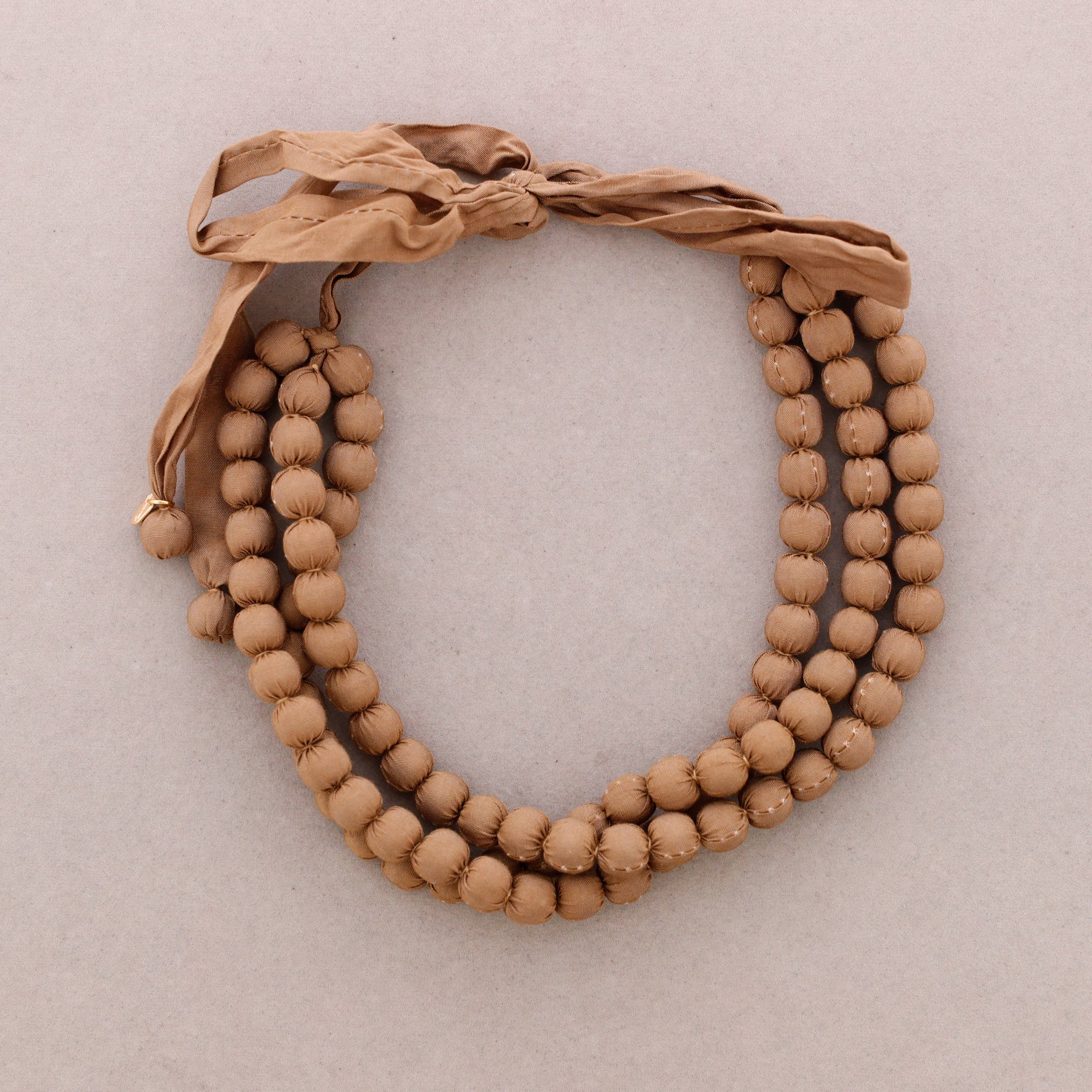 Collier Trois Tours Boules Revetues