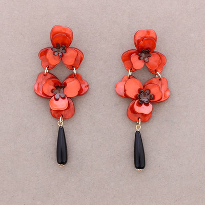 Boucles d'oreilles pendantes double fleur en résine